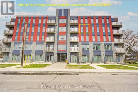 A multi-story building with a red and blue facade is shown.