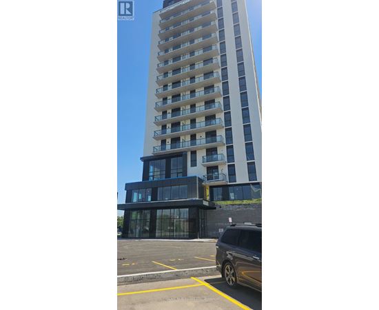 A tall building with a balcony on the side.