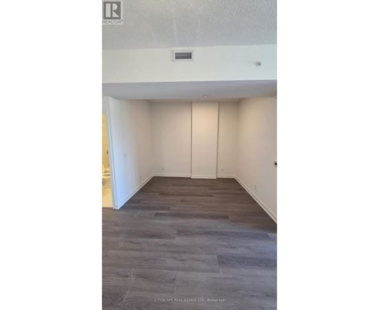 A floor plan for a 1 bedroom + den apartment.