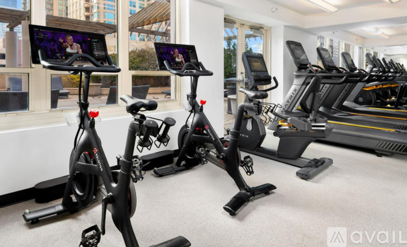 A gym with exercise bikes and treadmills.