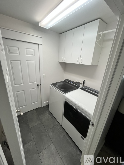 A small kitchen with a sink, stove and oven.