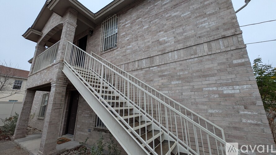 A house with a staircase leading to the second floor.