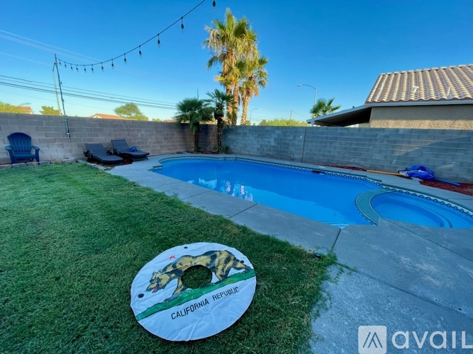 A pool with a California Republic sticker on the grass.