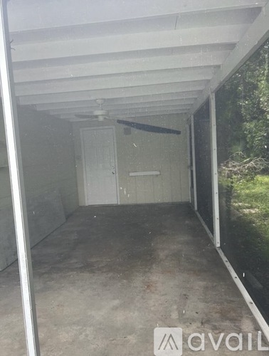 A room with a door and a window is available for rent.