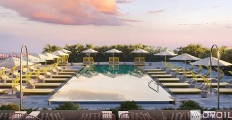 A pool area with sun loungers and umbrellas.