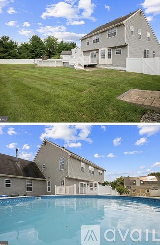 A house with a pool in the backyard.