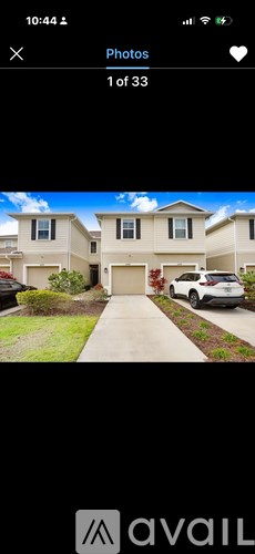 A car is parked in front of a house.