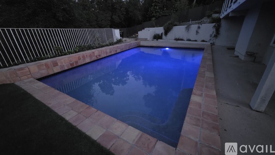 A pool with a black and red border.