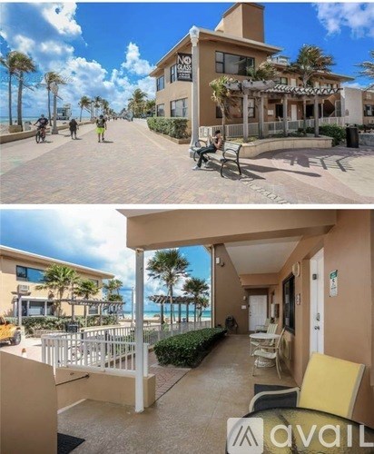 A beachfront property with a balcony and a view of the ocean.
