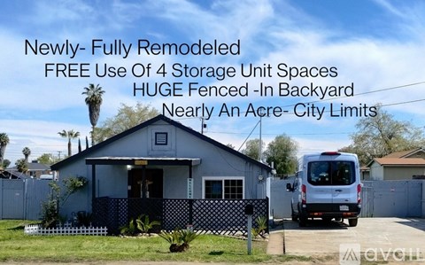 A house with a van parked in front and text overlay describing it as newly-fully remodeled with free use of 4 storage unit spaces.