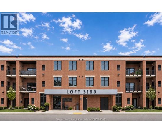 A large brick building with the number 3160 on the front.