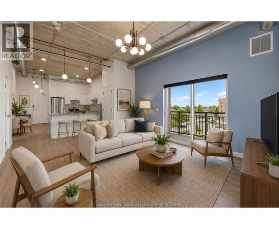A living room with a sofa, chairs, and a coffee table.