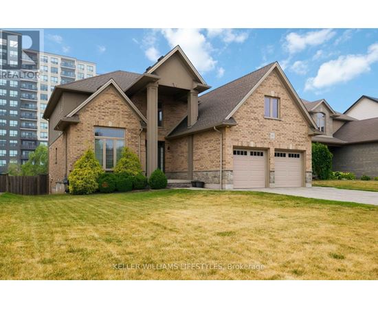 A large house with a brick facade and a stone entrance.