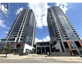 Two tall residential buildings stand side by side.