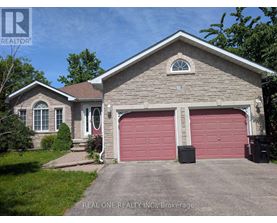 A house with a red garage door is for sale.