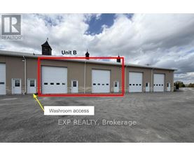 A building with a sign that says EXP REALTY, Brokerage.