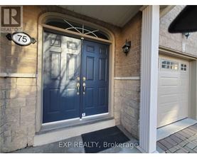 A blue door with a glass window and a metal handle.