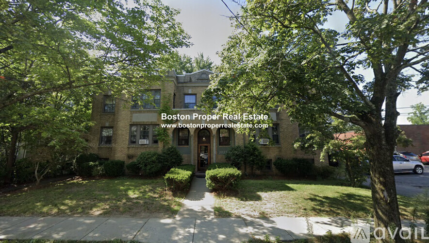 A building with the text "Boston Proper Real Estate" on it.