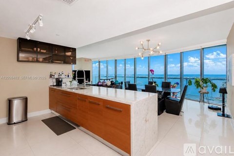 A spacious office with a view of the ocean.