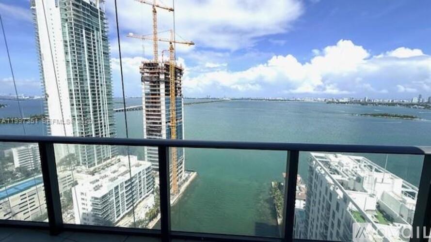 A construction site is visible from a high-rise building.