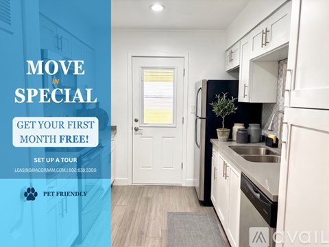 A kitchen interior with a sign offering a first month free for a move in special.