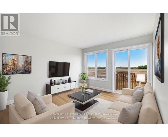 A living room with a couch, a coffee table, and a television.