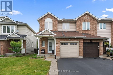 A large house with a garage is for sale.