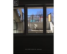 A window with a view of a playground outside.