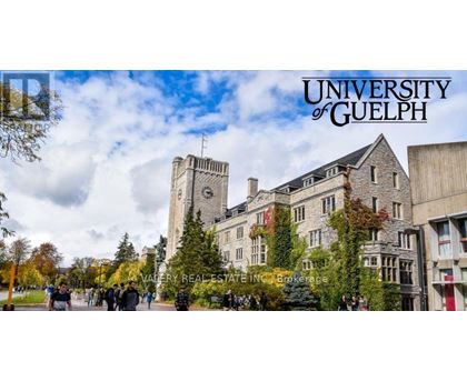The University of Guelph building with students walking around.