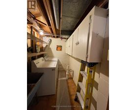 A laundry room with a washer and dryer.