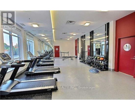 A gym with treadmills and exercise equipment is available for use.
