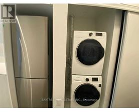 A washer and dryer are in a small space.