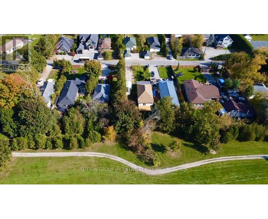 A residential area with houses and trees.