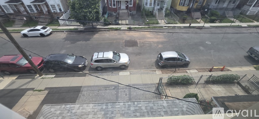 A car is parked on the side of the street.