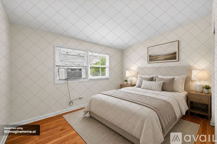 A bedroom with a large bed and a window with blinds.