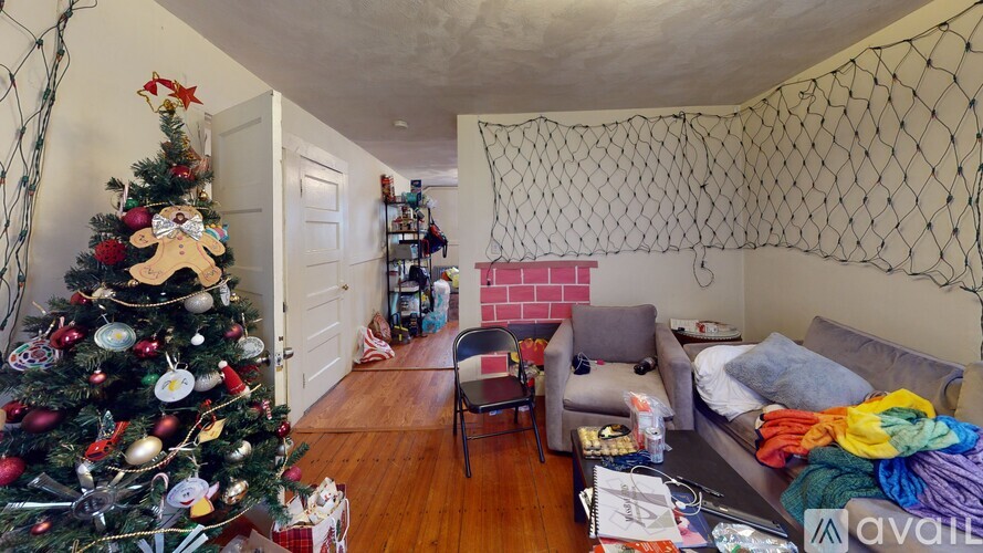 A Christmas tree is decorated with ornaments and a star on top.
