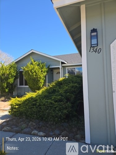 A house numbered 1340 is shown in the image.
