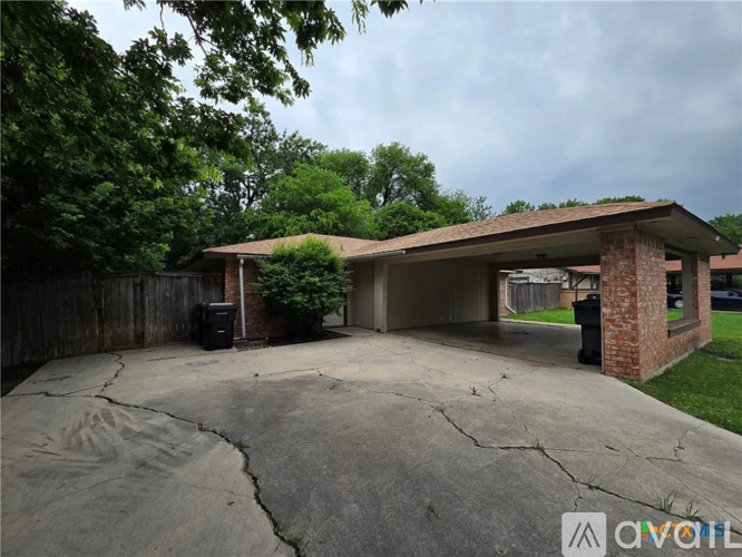 A house with a driveway and a garage.