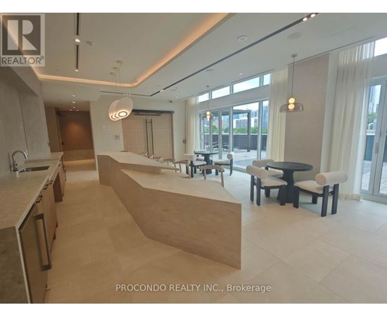 A spacious kitchen and dining area with a modern design.