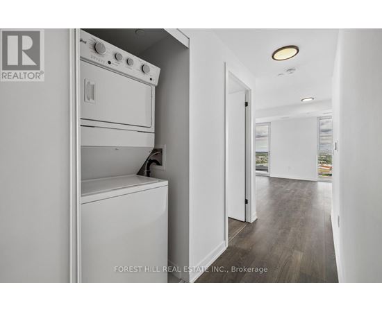A white oven and dishwasher in a modern kitchen.