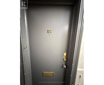 A door with the number 102 on it.
