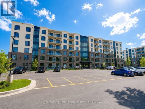 A sunny day at the Century 21 Millennium, Inc. Brokerage building with cars parked in the lot.