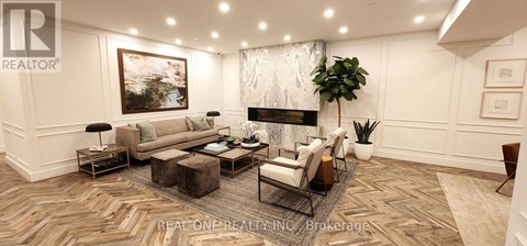 A living room with a large painting on the wall and a fireplace.