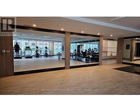 A gym with a variety of equipment is shown in the image.