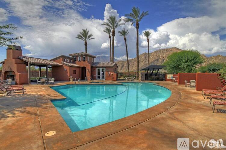 A large swimming pool in a desert-like setting.