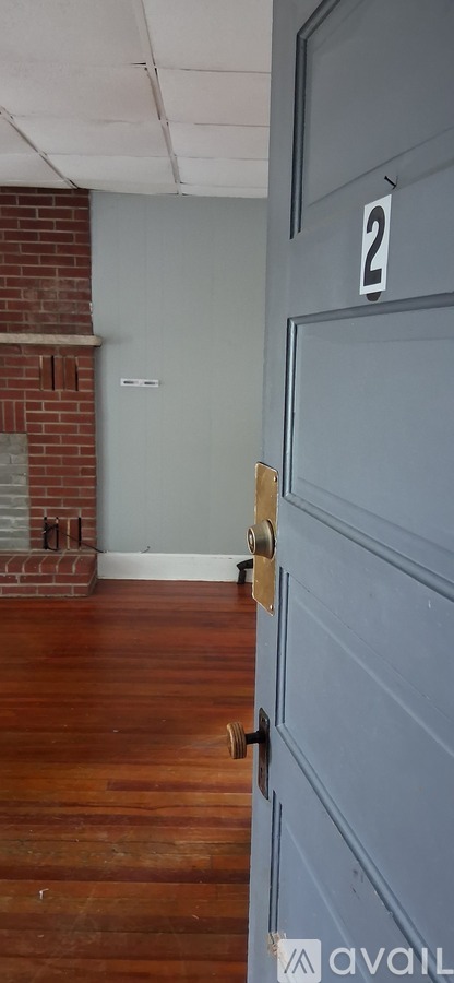 A blue door with a number 2 on it.