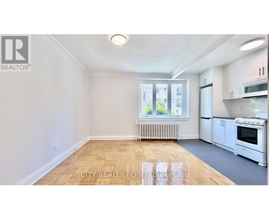 A realtor logo is on the top left corner of the image.
