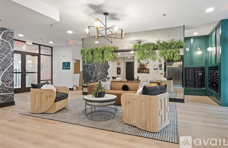 A modern living room with a wooden sofa set and a coffee table.