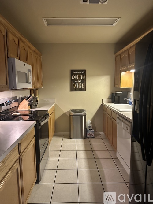 A kitchen with a sign that says "Coffee House".