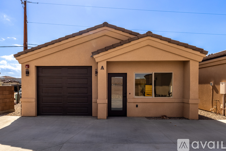 A house with a brown garage door and a brown wall.
